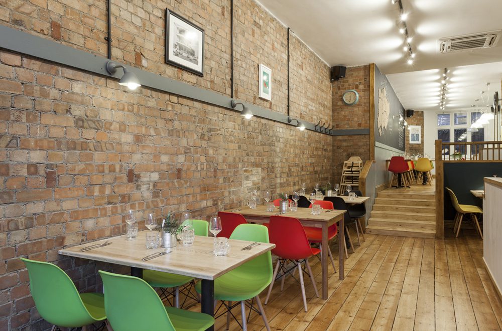 Hood-brick wall - english restaurant London